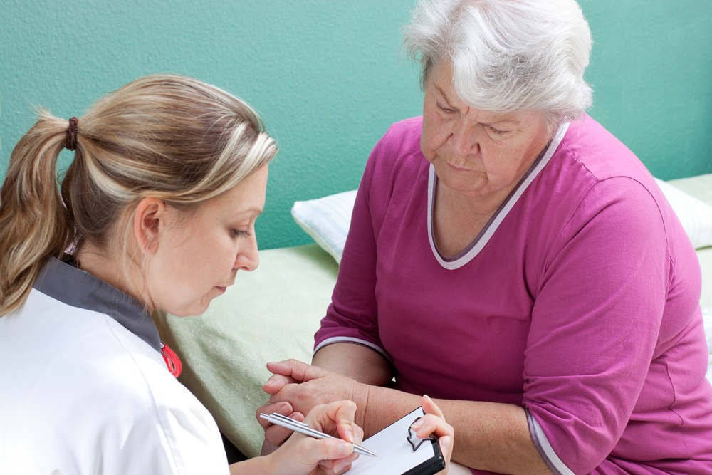 Sjuksköterska och patient